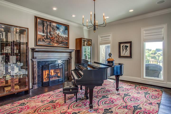 6664 Cross Keys Road College Grove, TN 37046 - Photo 6 of 29 Music/Office/Library just off the entry with gas log fireplace w/marble surround & wood mantle. Powder room w/Steinway pedestal sink.