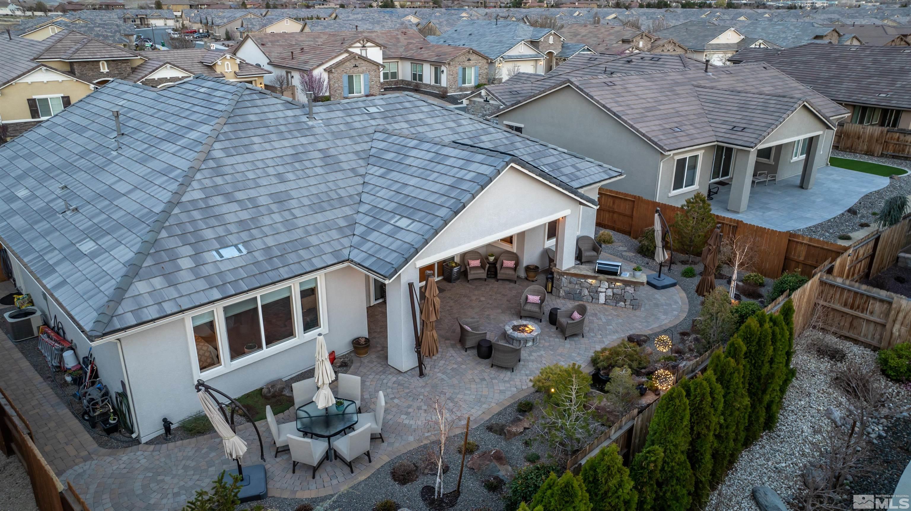 9805 Shadowless Trail Reno, NV 89521 - Photo 1 of 33 an aerial view of residential houses with outdoor space