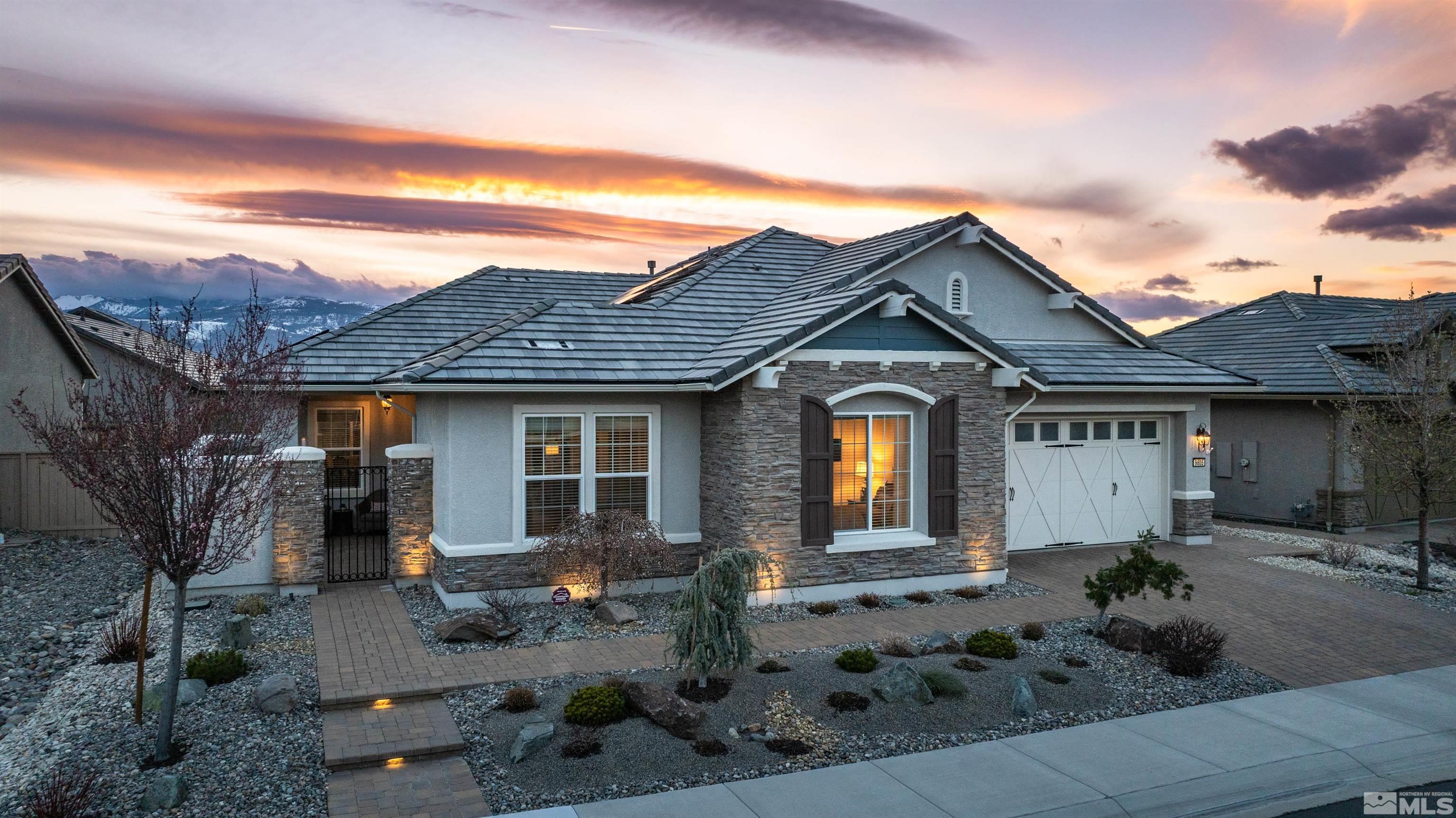 9805 Shadowless Trail Reno, NV 89521 - Photo 24 of 33 front view of a house with a yard
