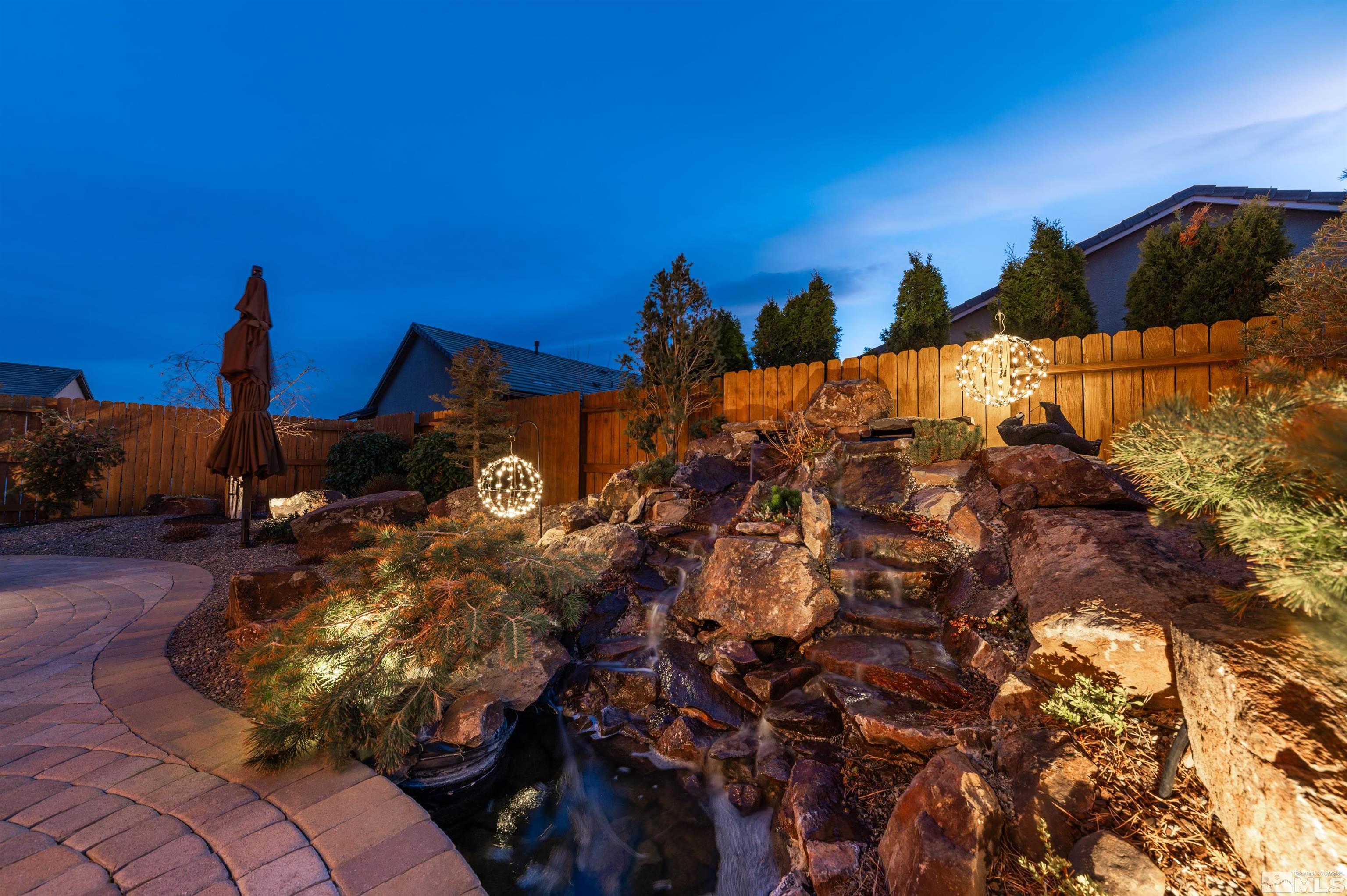 9805 Shadowless Trail Reno, NV 89521 - Photo 26 of 33 a view of a house with a tree