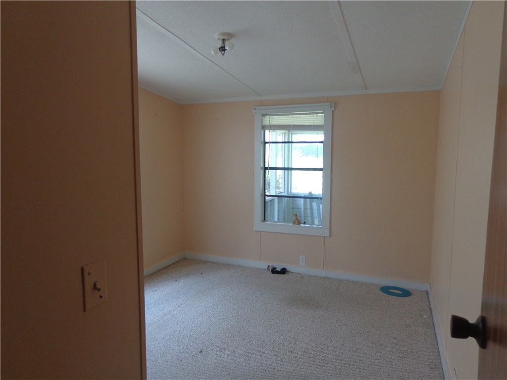 56002 Griffin Road Callahan, FL 32011 - Photo 7 of 10 a view of an empty room with a window