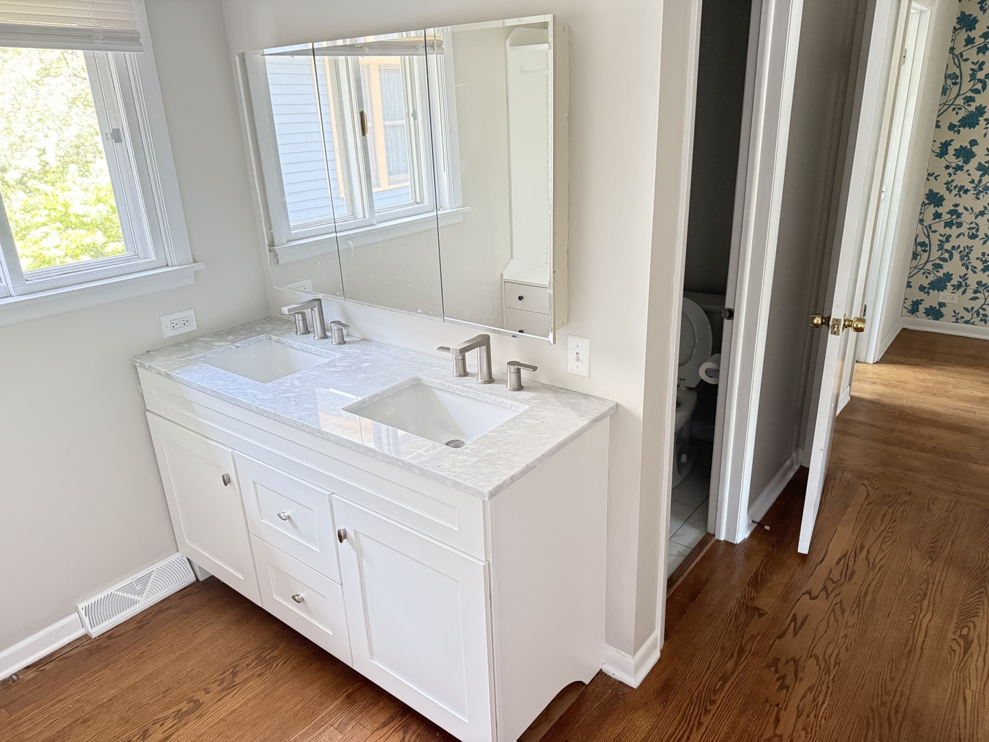 36 Washington Road, Unit 1 Lake Forest, IL 60045 - Photo 12 of 17 a bathroom with a sink and a mirror