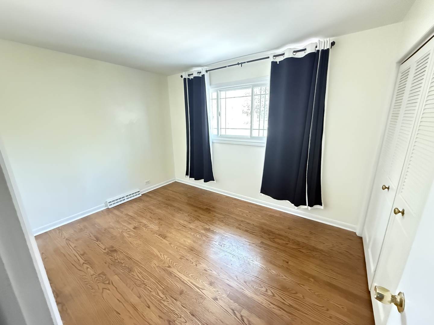 36 Washington Road, Unit 1 Lake Forest, IL 60045 - Photo 17 of 17 a view of an empty room and wooden floor
