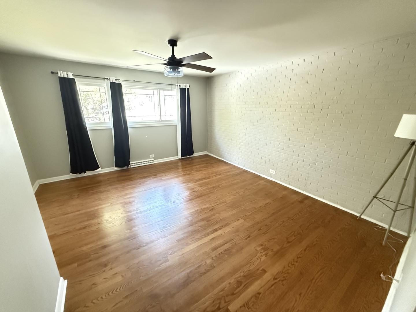 36 Washington Road, Unit 1 Lake Forest, IL 60045 - Photo 10 of 17 a view of an empty room with wooden floor and a window