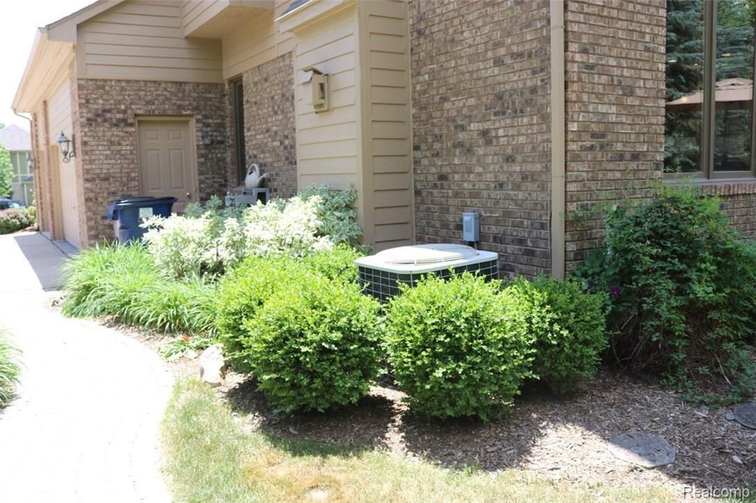 THE HOUSE IS EQUIPPED WITH CENTRAL AIR AND THE DOOR ENTERS THE GARAGE
