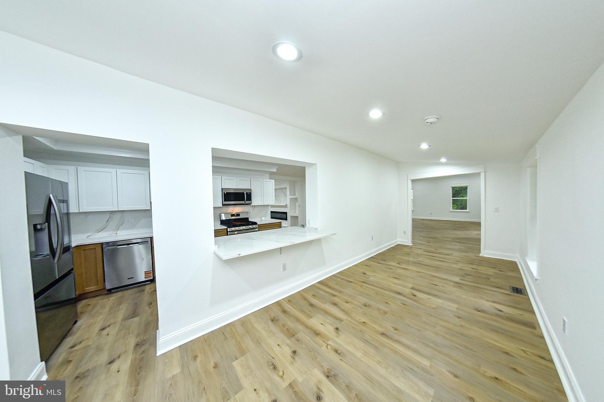 3704 Suitland Road Southeast Washington, DC 20020 - Photo 10 of 70 Spacious, modern open-concept living.