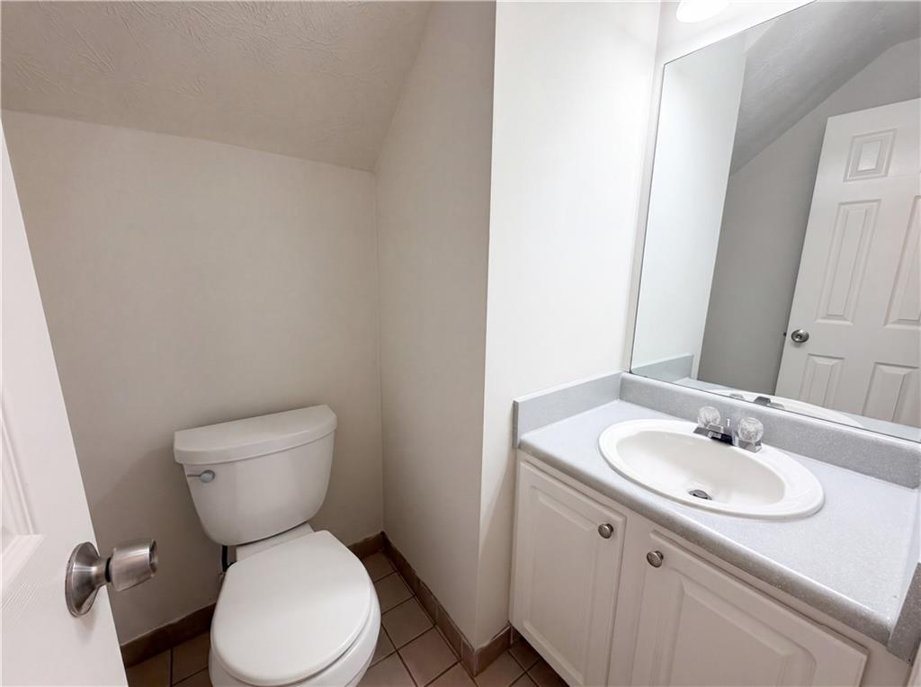 722 Ridgetop Road Bethlehem, GA 30620 - Photo 19 of 23 a bathroom with a sink toilet and a mirror