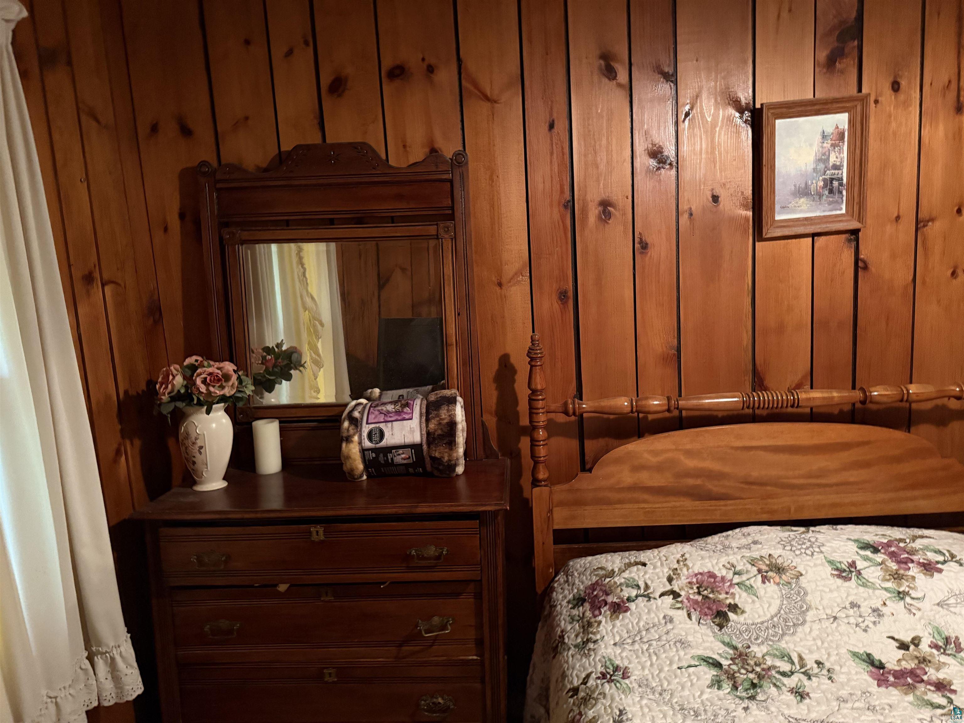 69175 East Long Lake Road Iron River, WI 54847 - Photo 22 of 47 Bedroom with wood walls