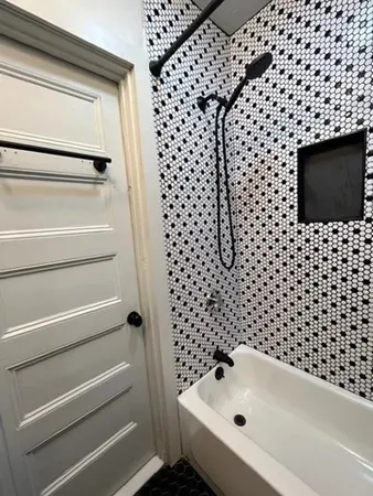 a bathroom with a bathtub