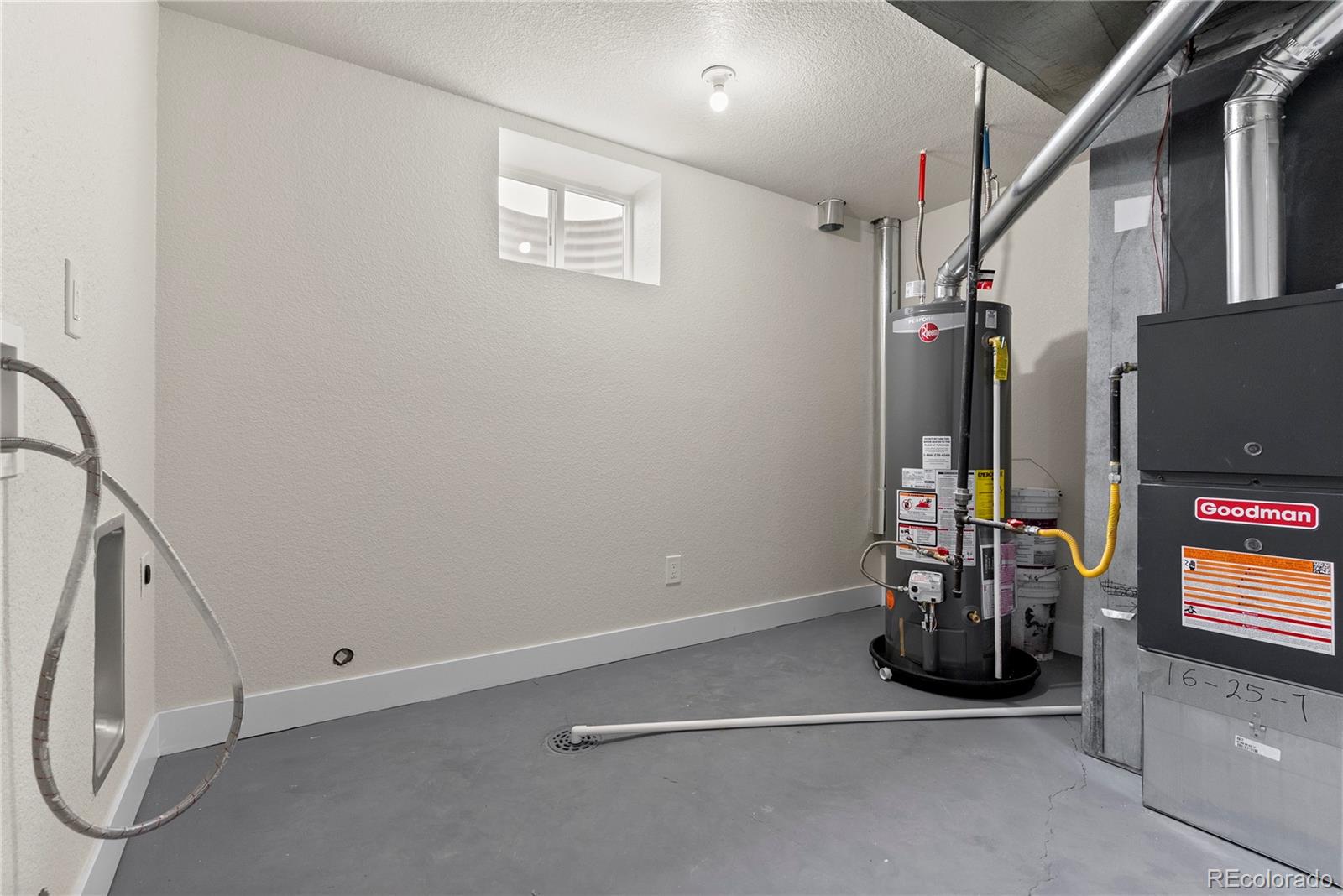 7961 Granada Road Denver, CO 80221 - Photo 23 of 31 an empty room with windows