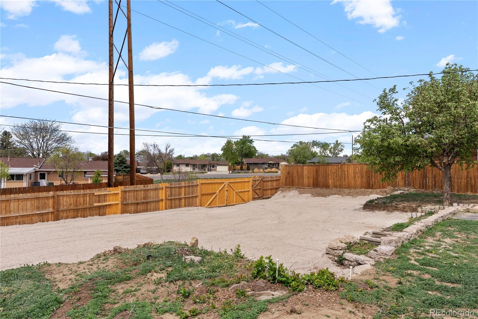 7961 Granada Road Denver, CO 80221 - Photo 27 of 31 a view of a lake with a yard