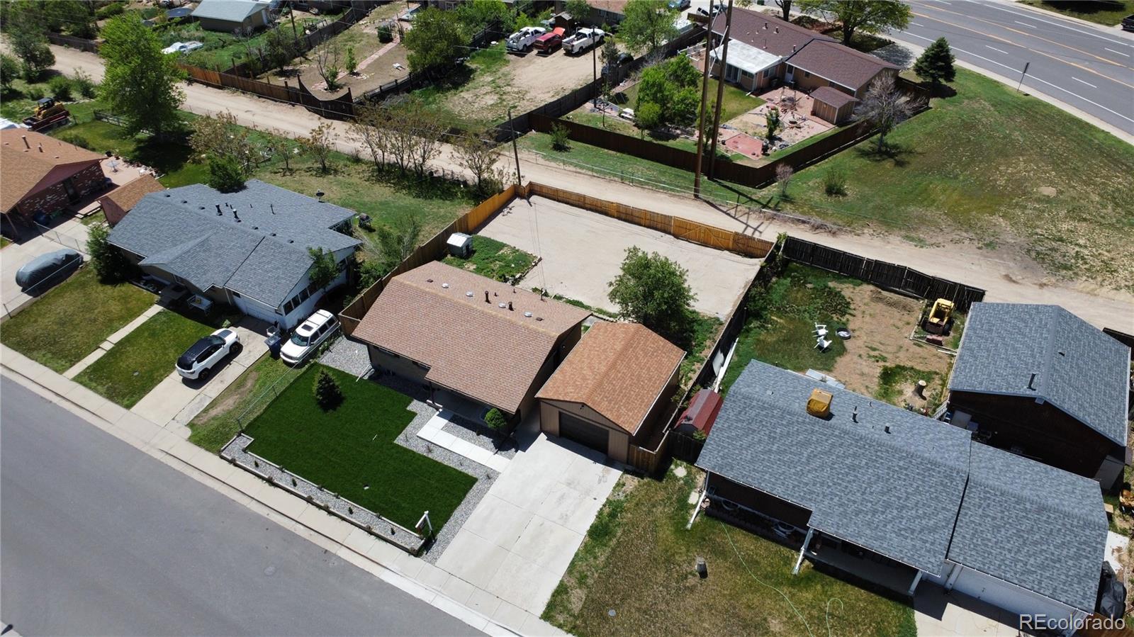 7961 Granada Road Denver, CO 80221 - Photo 28 of 31 an aerial view of a house with a yard