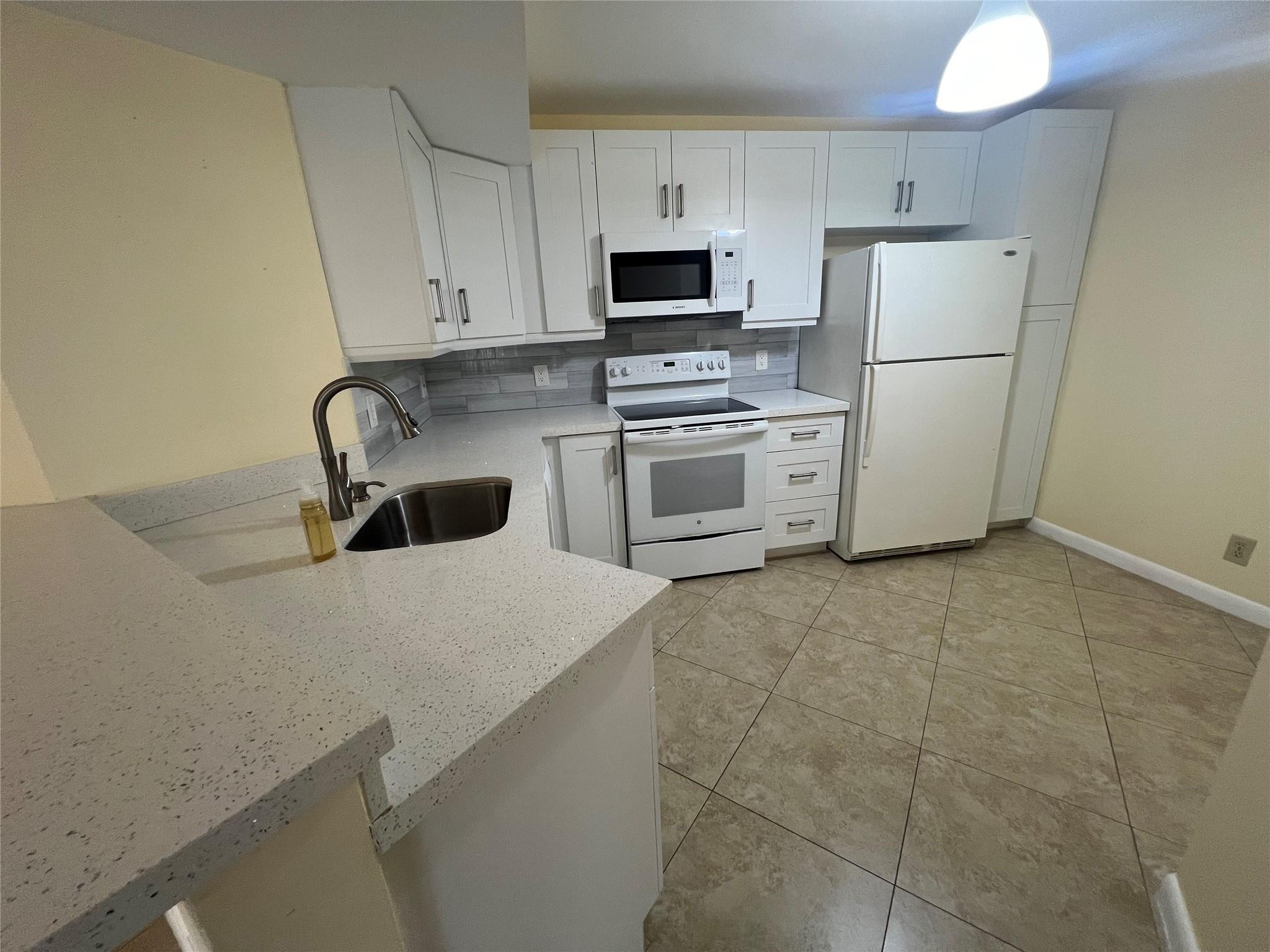 8977 Wiles Road, Unit 206 Coral Springs, FL 33067 - Photo 12 of 50 Photo 11