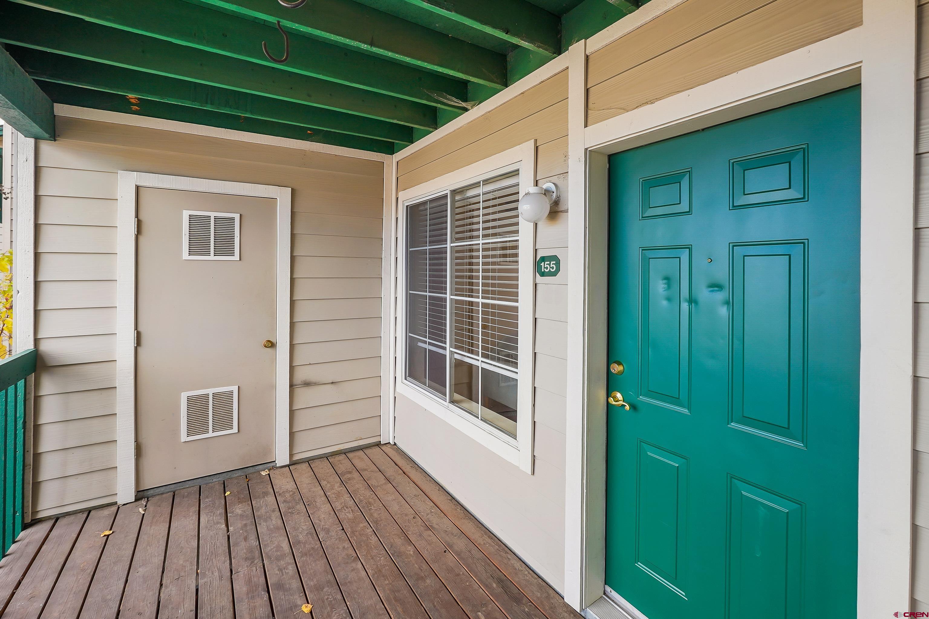 1100 Goeglein Gulch Road, Unit 155 Durango, CO 81301 - Photo 2 of 15 a view of outdoor space and deck