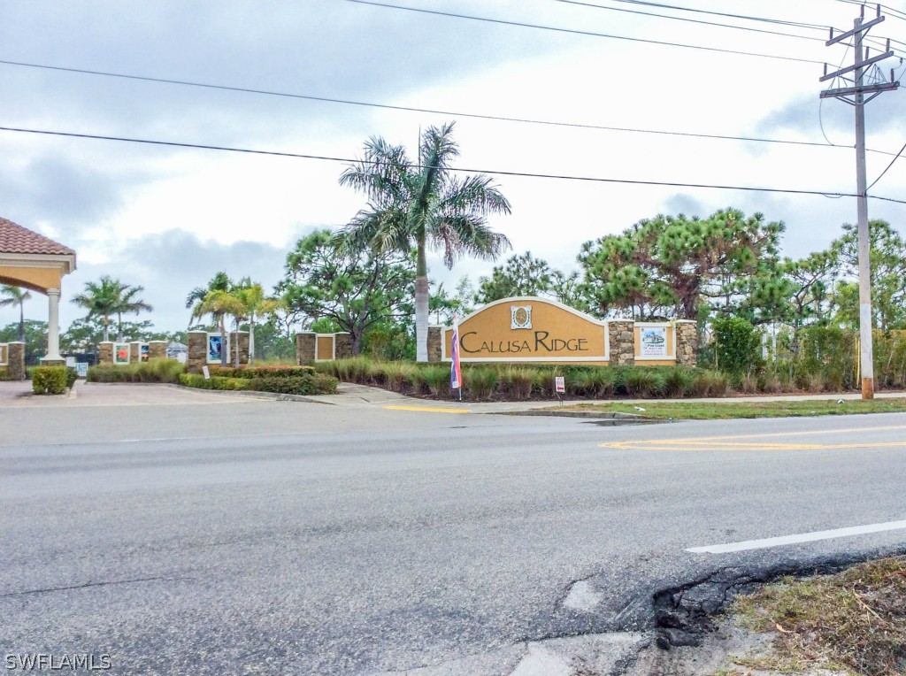 6017 Calusa Rdg Trail Bokeelia, FL 33922 - Photo 23 of 24 a palm tree sitting in front of a house