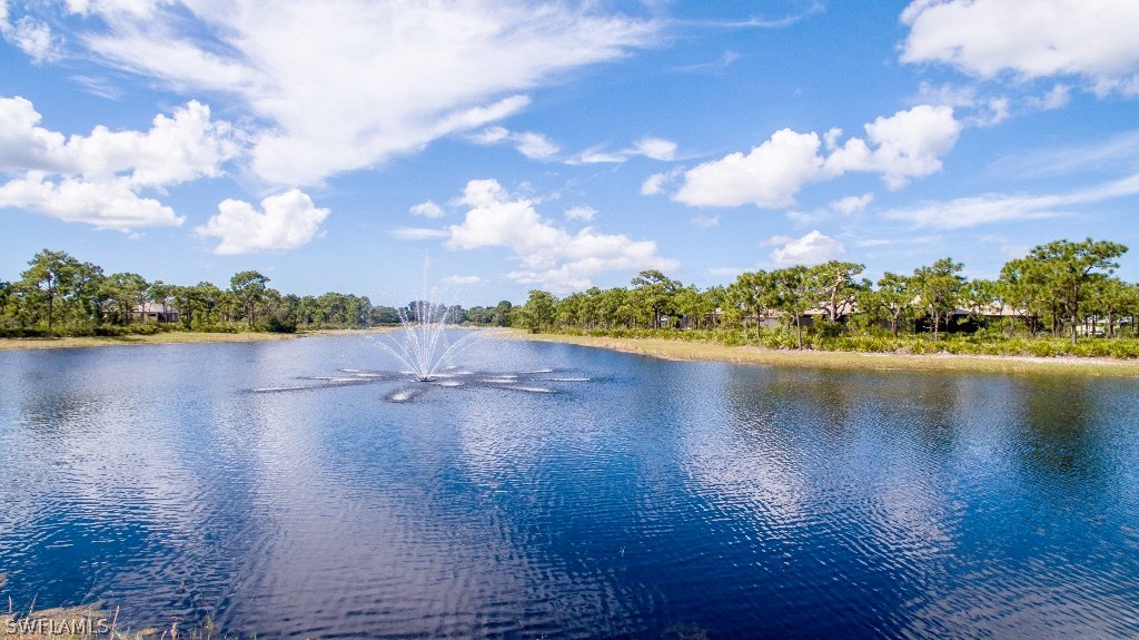 6017 Calusa Rdg Trail Bokeelia, FL 33922 - Photo 9 of 24 a view of a lake with houses in the back