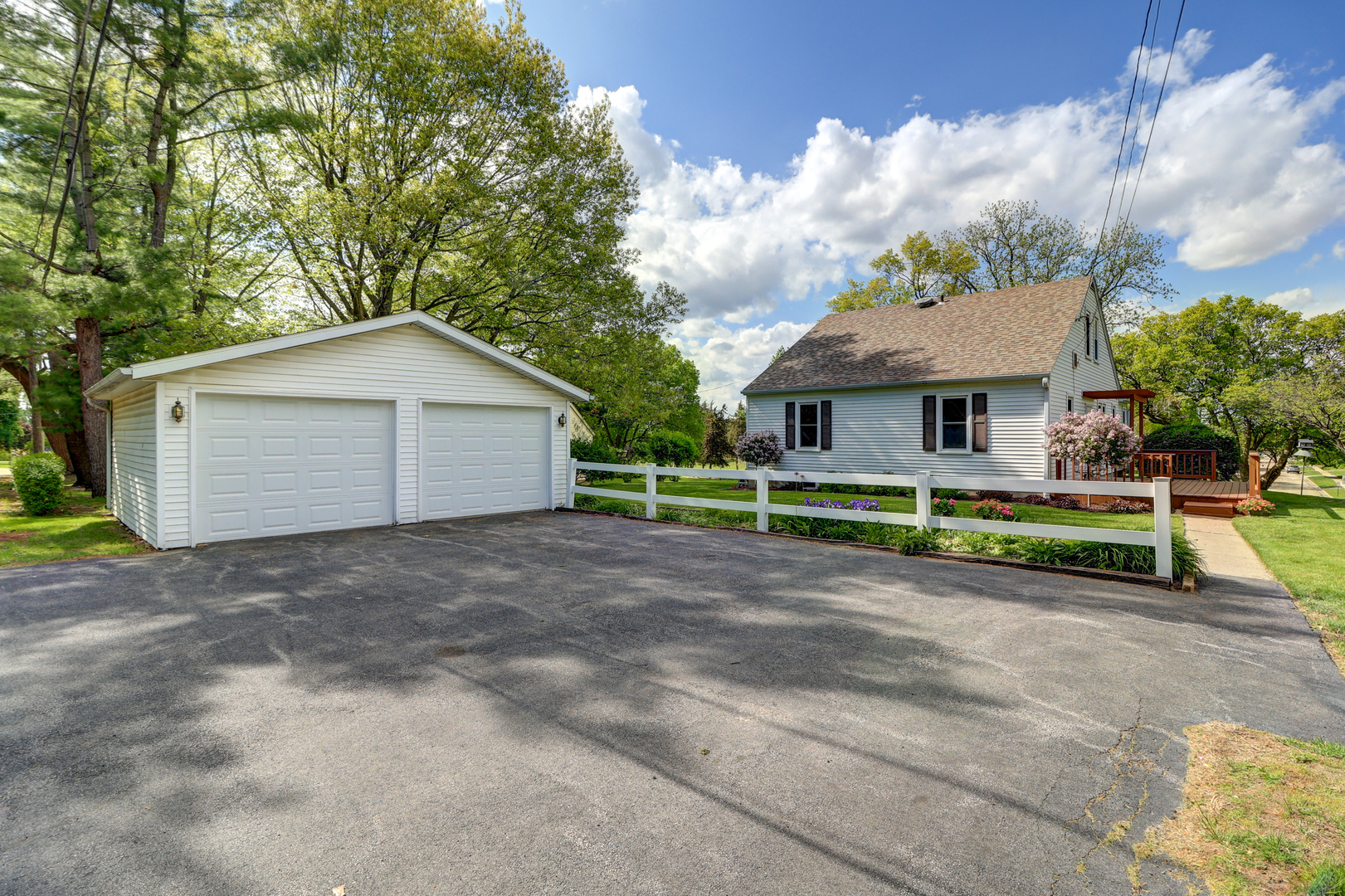 313 West 2nd Street Prophetstown, IL 61277 - Photo 18 of 22 a view of a house with a yard and garage