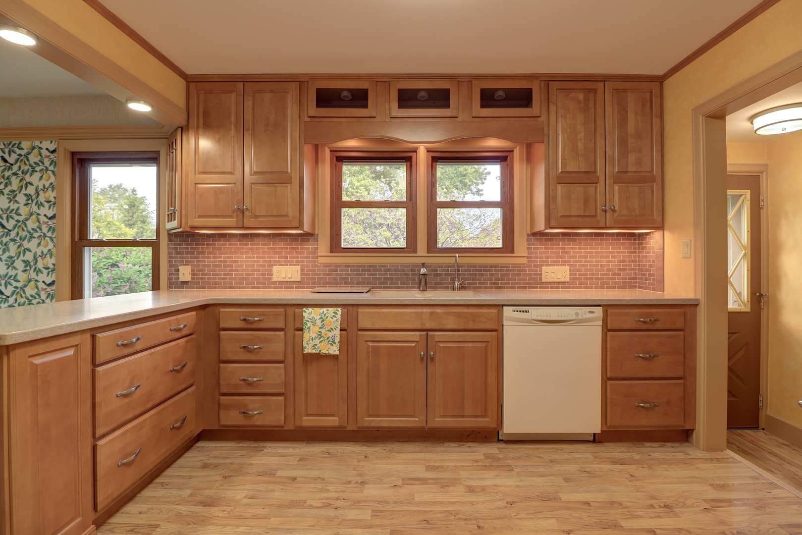 313 West 2nd Street Prophetstown, IL 61277 - Photo 2 of 22 a kitchen with granite countertop white cabinets and window