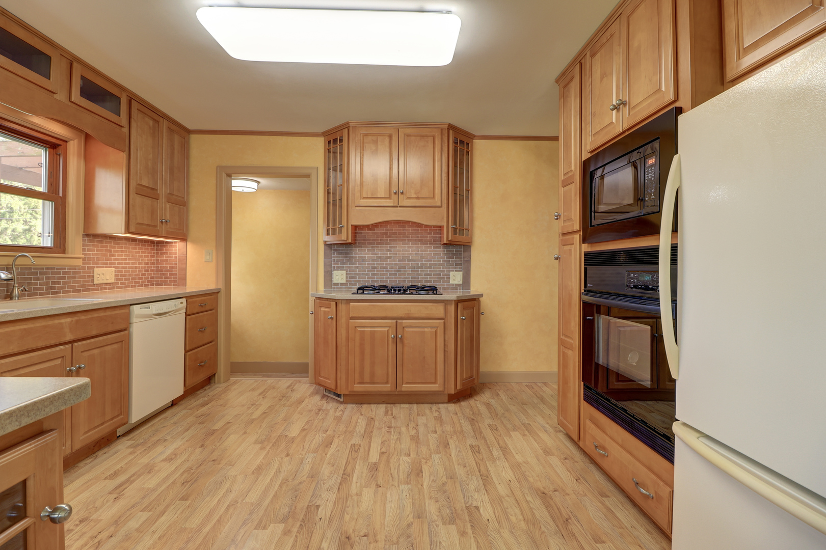 313 West 2nd Street Prophetstown, IL 61277 - Photo 3 of 22 a kitchen with granite countertop cabinets stainless steel appliances and a sink