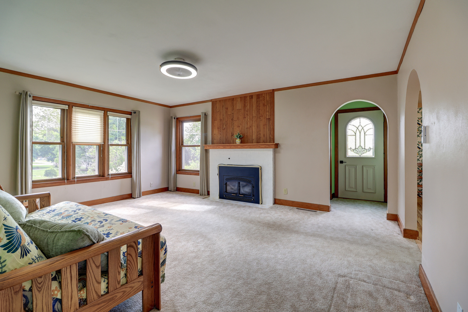 313 West 2nd Street Prophetstown, IL 61277 - Photo 7 of 22 a view of a livingroom with an empty space and a fireplace