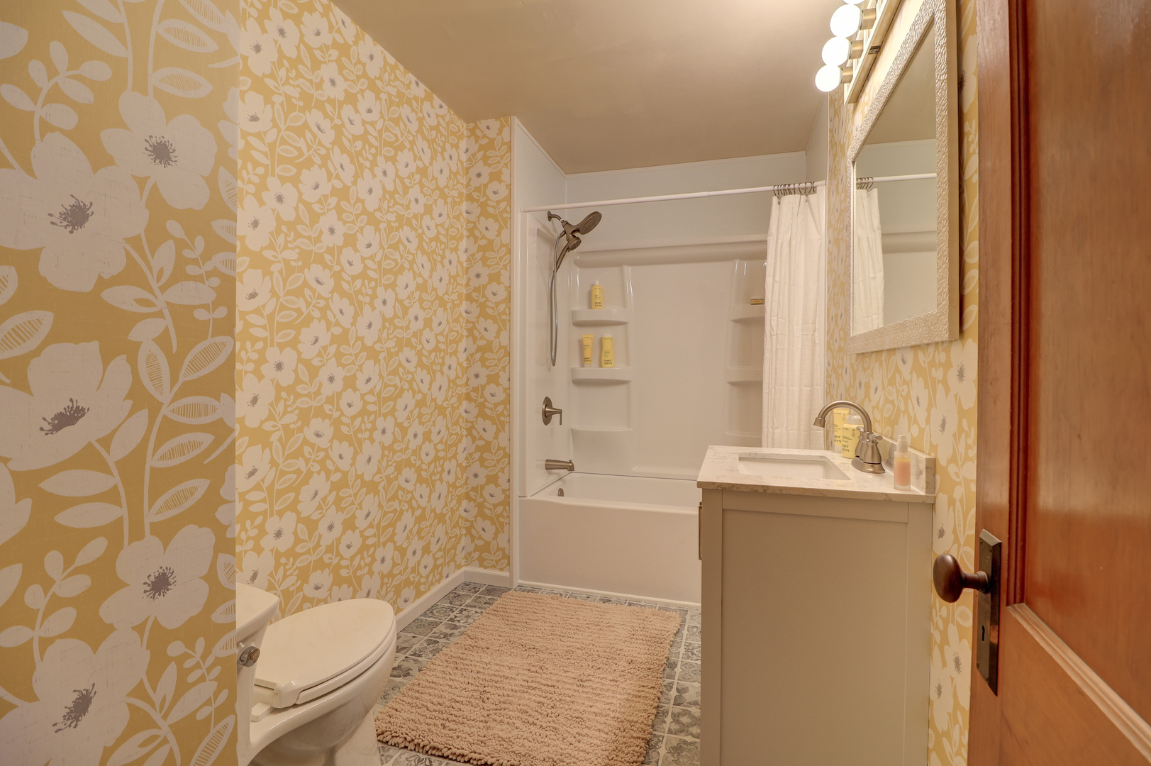 313 West 2nd Street Prophetstown, IL 61277 - Photo 10 of 22 a bathroom with a granite countertop sink toilet and shower