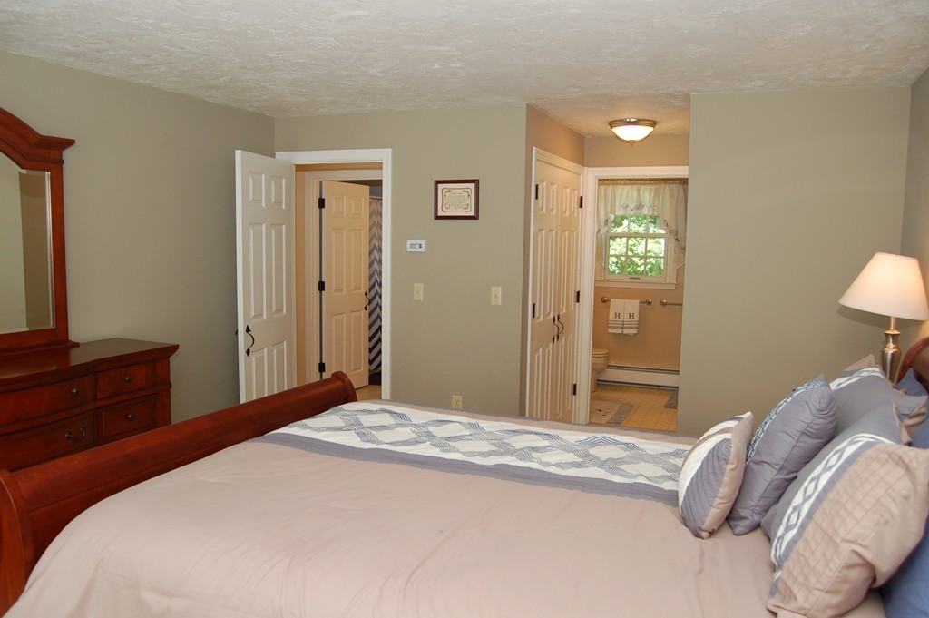 6 Schofield Road Hopkinton, MA 01748 - Photo 14 of 30 a bedroom with a bed and a dresser
