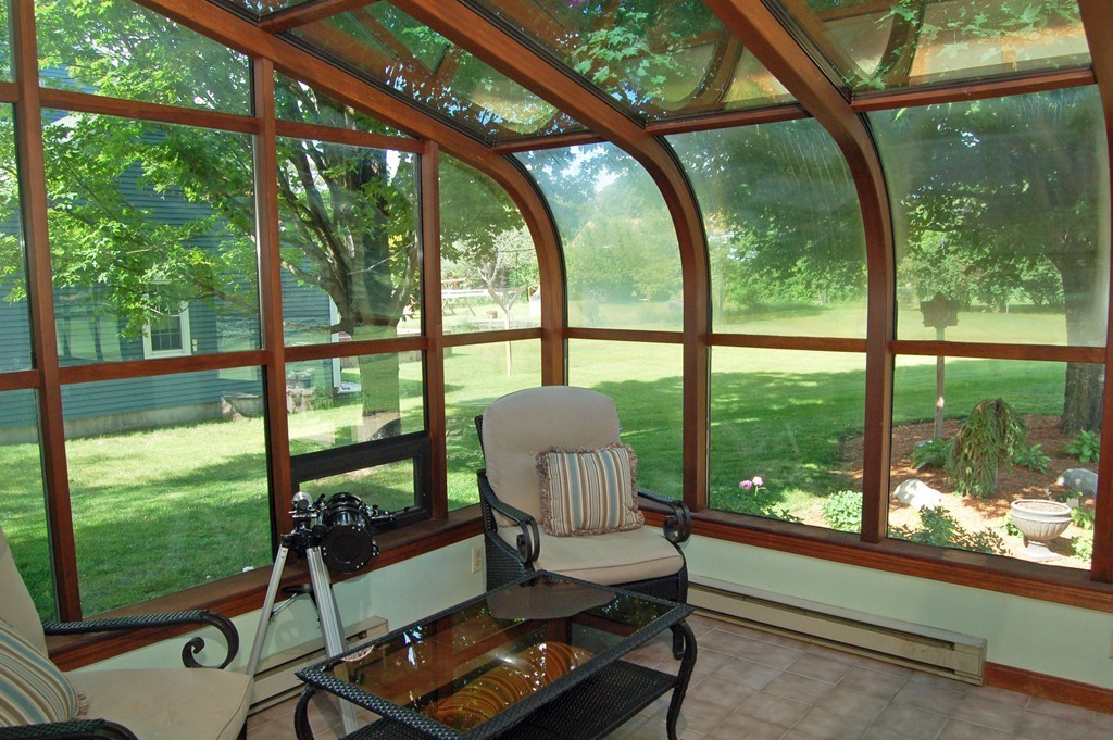 6 Schofield Road Hopkinton, MA 01748 - Photo 22 of 30 a room with large windows and view of outdoor space