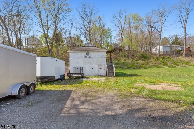 19 Dunham Road West Milford, NJ 07421 - Photo 11 of 14 a view of a house with pool and yard