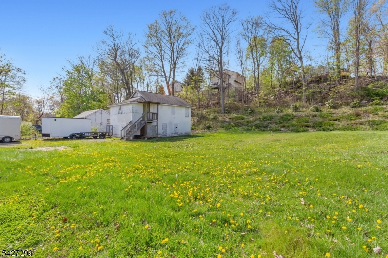 19 Dunham Road West Milford, NJ 07421 - Photo 3 of 14 a view of an outdoor space and a yard