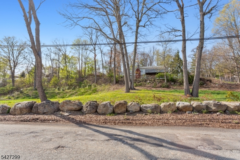 19 Dunham Road West Milford, NJ 07421 - Photo 9 of 14 a view of a swimming pool with a yard