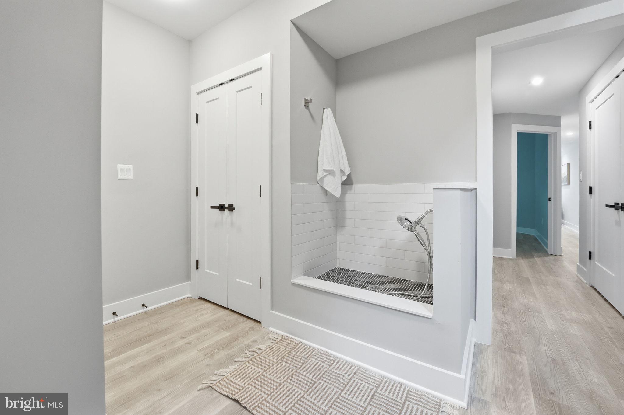 2211 Military Road Arlington, VA 22207 - Photo 83 of 107 Modern entryway with stylish shower nook.