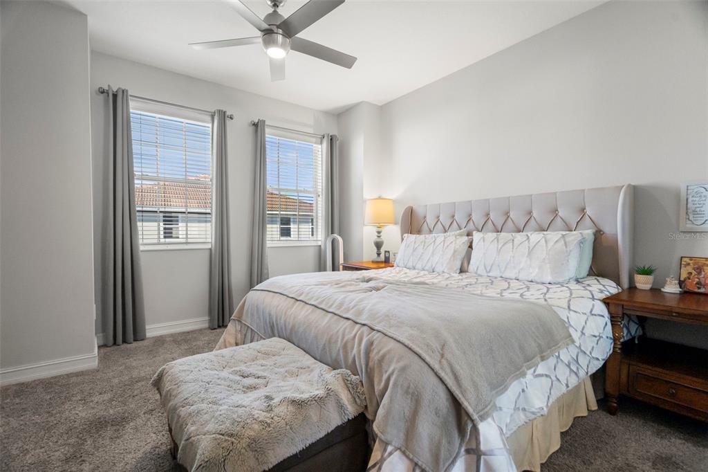 1342 Ribolla Drive Palm Harbor, FL 34683 - Photo 25 of 37 a bedroom with a bed and a window