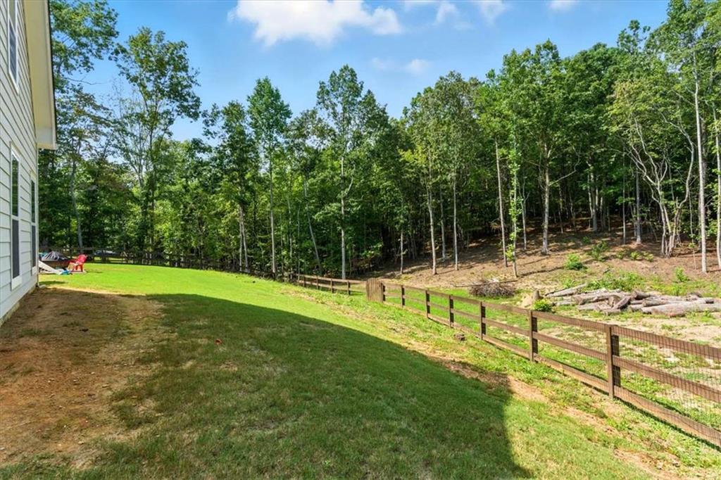 62 Joe Rowell Road Buchanan, GA 30113 - Photo 51 of 63 a view of swimming pool with a yard
