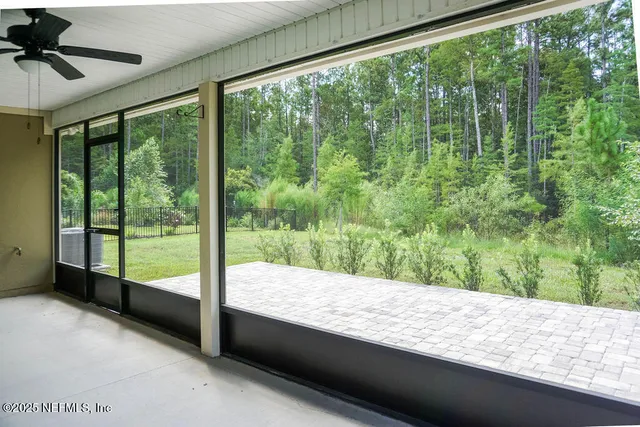 a view of a porch and garden