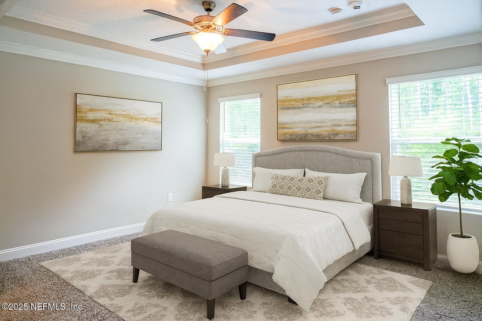 114 Eagles Landing Ln Street St. Augustine, FL 32095 - Photo 10 of 21 a bedroom with a bed and a potted plant