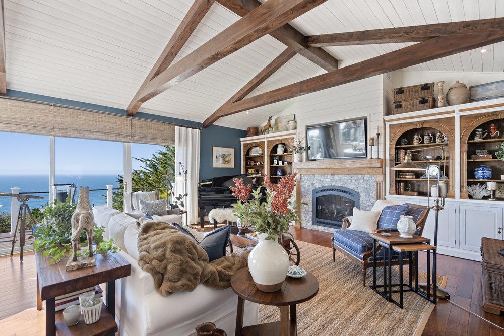 15 Mentone Road Carmel, CA 93923 - Photo 19 of 56 a living room with furniture fireplace and wooden floor