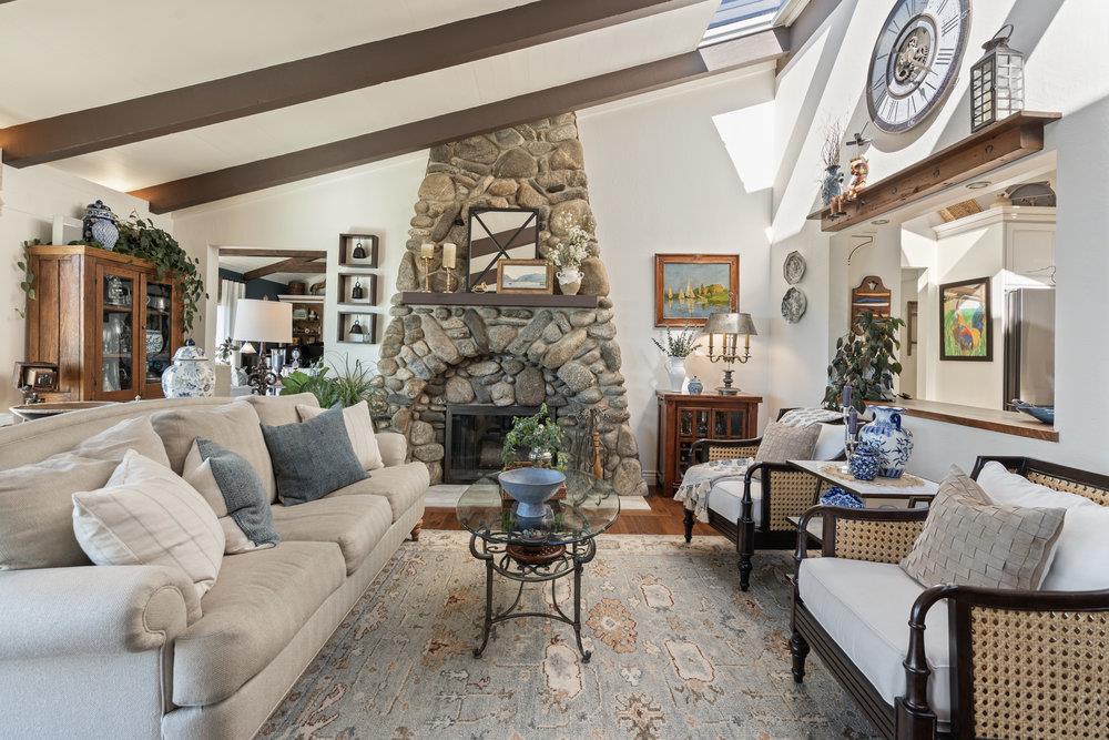 15 Mentone Road Carmel, CA 93923 - Photo 21 of 56 a living room with furniture and a fireplace