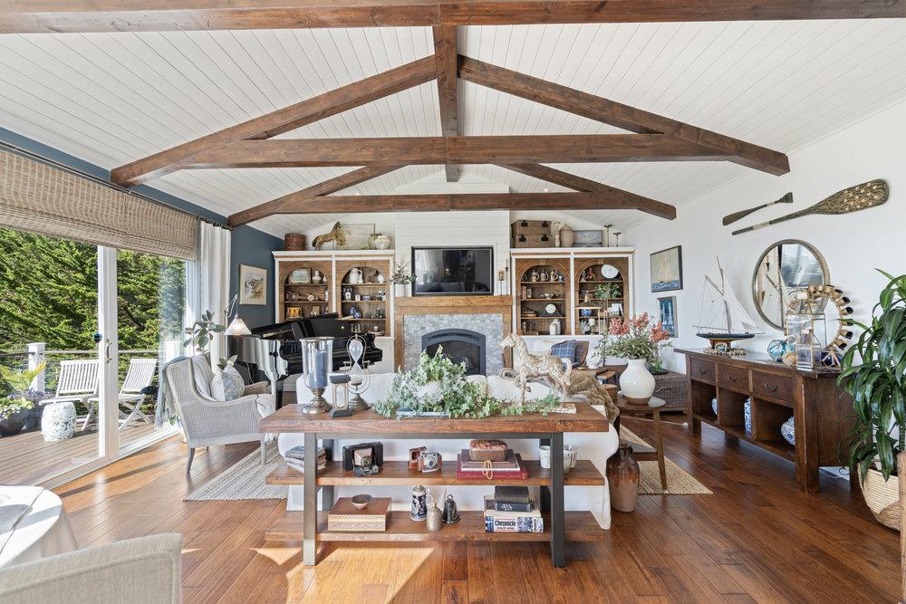 15 Mentone Road Carmel, CA 93923 - Photo 27 of 56 a living room with fireplace furniture and a large window