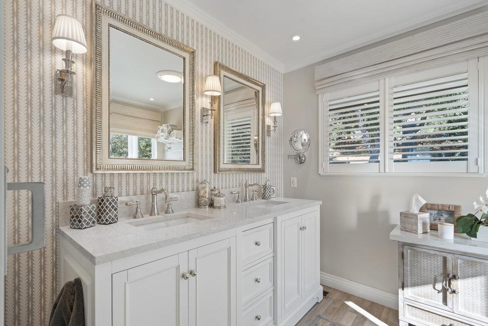 15 Mentone Road Carmel, CA 93923 - Photo 34 of 56 a bathroom with a sink double vanity and a mirror