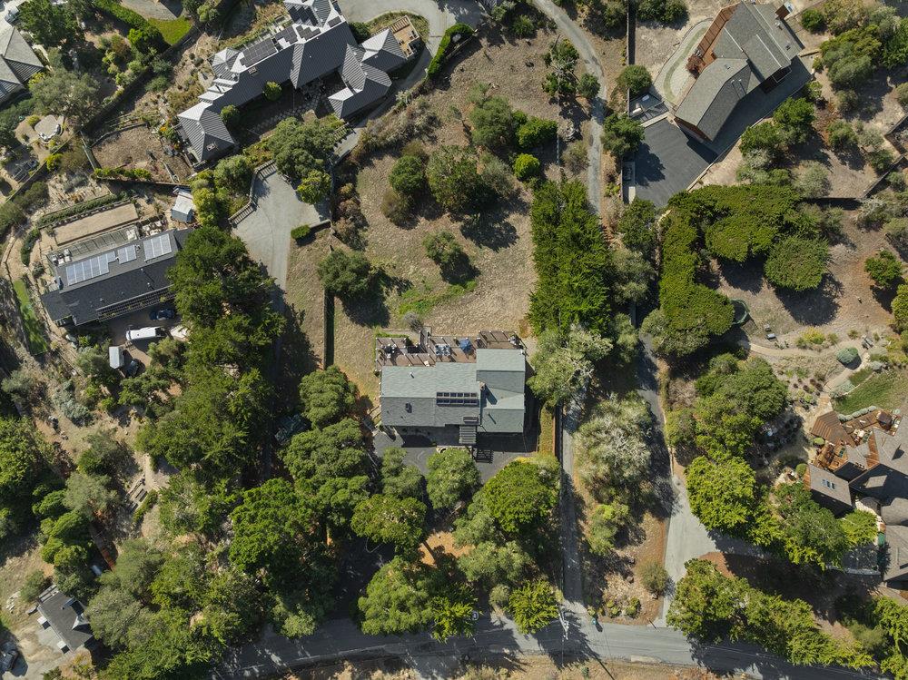 15 Mentone Road Carmel, CA 93923 - Photo 53 of 56 an aerial view of a house with a yard and lake view