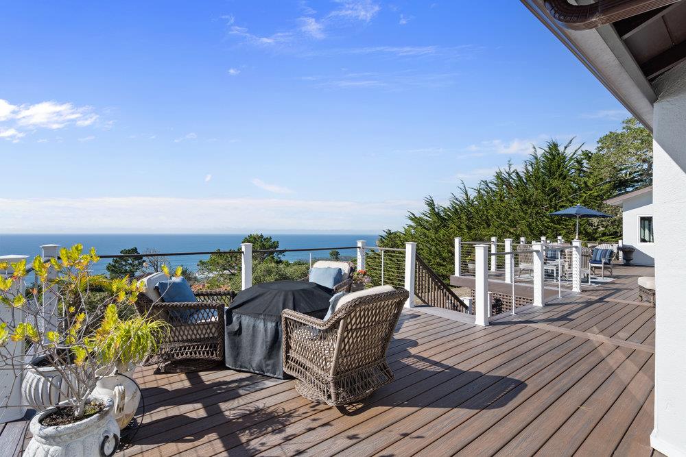 15 Mentone Road Carmel, CA 93923 - Photo 6 of 56 a view of a chairs and table in patio