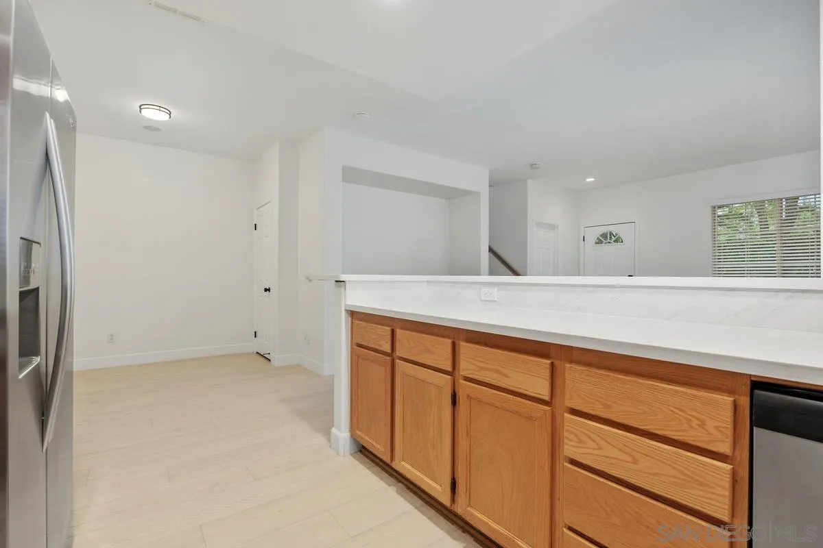 4054 Craven Road, Unit 49 Oceanside, CA 92057 - Photo 13 of 37 a bathroom with a sink and a mirror