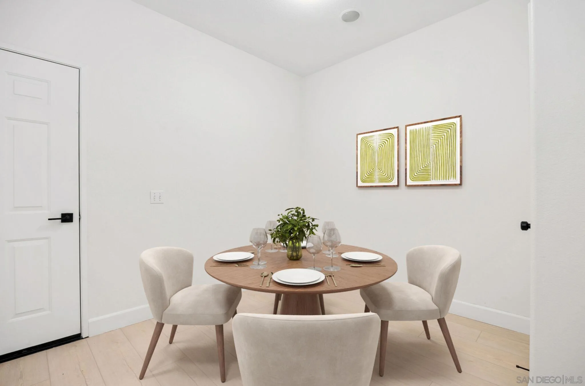 4054 Craven Road, Unit 49 Oceanside, CA 92057 - Photo 14 of 37 a view of a dining room with furniture and wooden floor