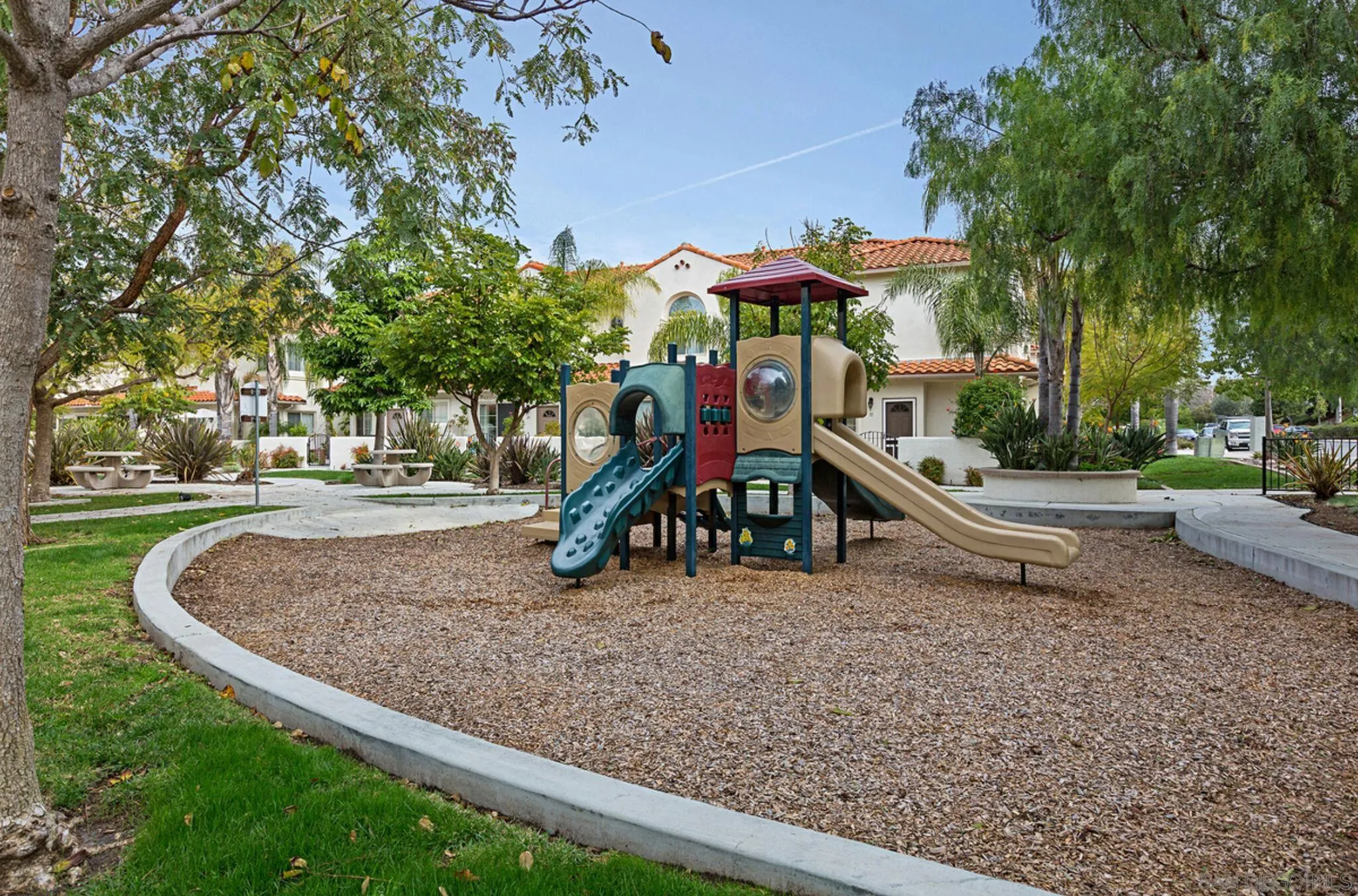 4054 Craven Road, Unit 49 Oceanside, CA 92057 - Photo 37 of 37 a view of outdoor space with playground and green space