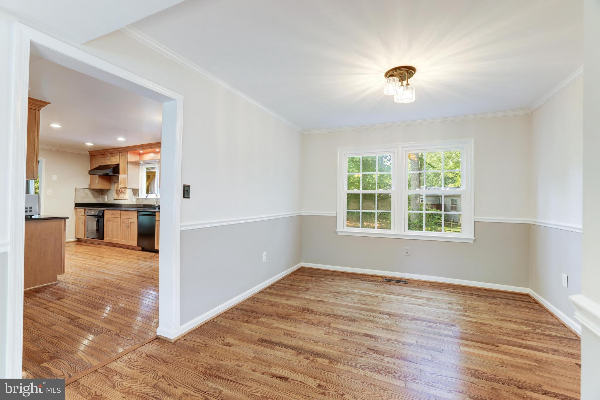 1816 Post Oak Trail Reston, VA 20191 - Photo 18 of 58 Refinished hardwood flooring in dining room