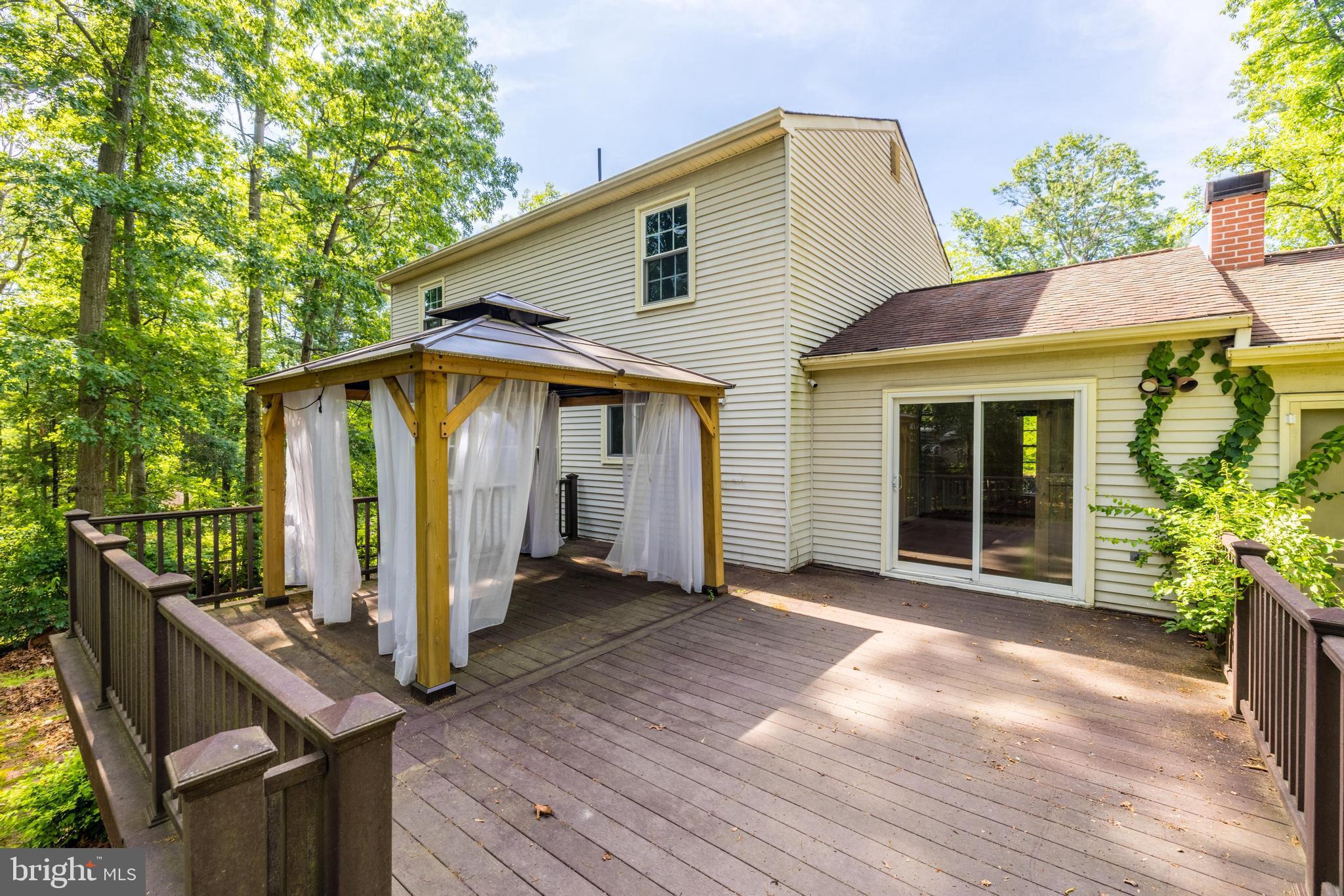 1816 Post Oak Trail Reston, VA 20191 - Photo 44 of 58 Fantastic large deck with gazebo