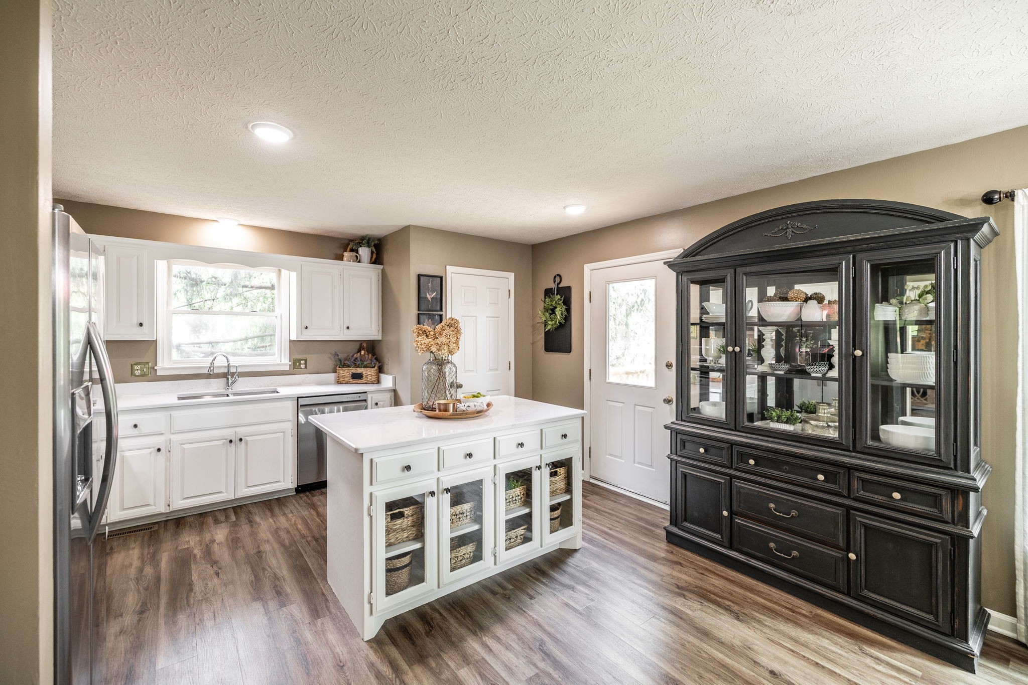 405 Timberlake Drive Springfield, TN 37172 - Photo 17 of 46 a kitchen with a stove a sink and wooden floor
