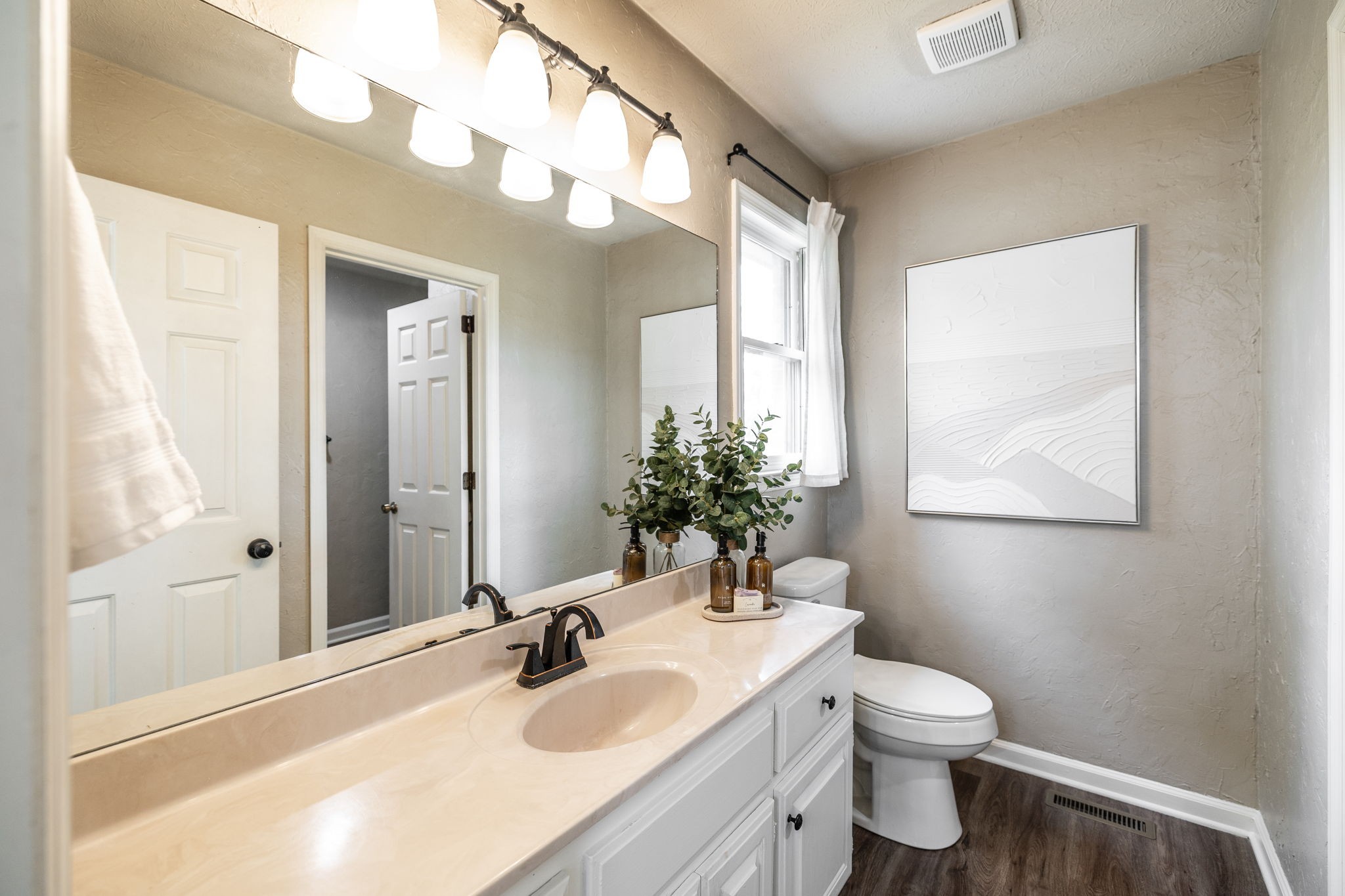 405 Timberlake Drive Springfield, TN 37172 - Photo 30 of 46 a bathroom with a sink vanity granite and toilet
