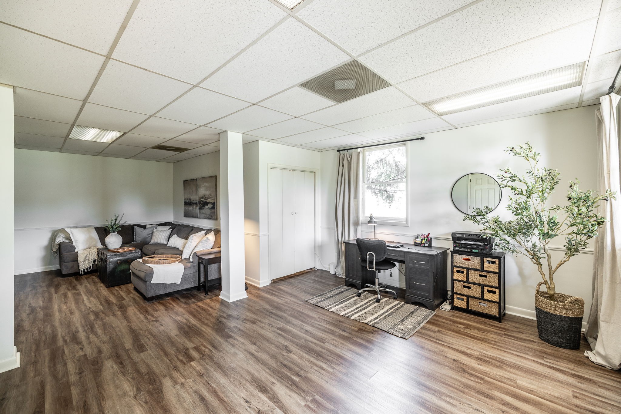 405 Timberlake Drive Springfield, TN 37172 - Photo 36 of 46 a living room with furniture a fireplace and wooden floor