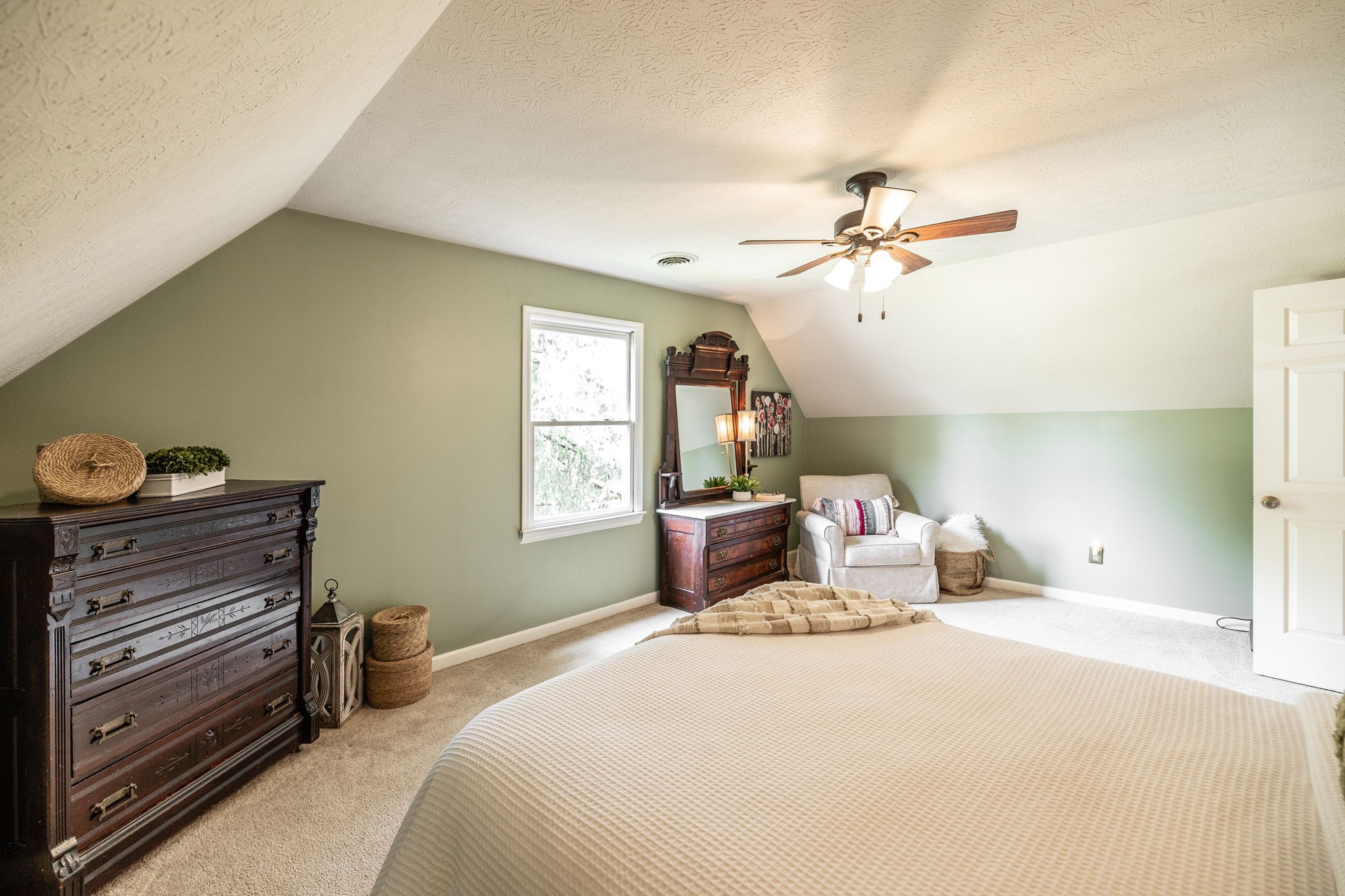 405 Timberlake Drive Springfield, TN 37172 - Photo 41 of 46 a bedroom with a bed and a chandelier